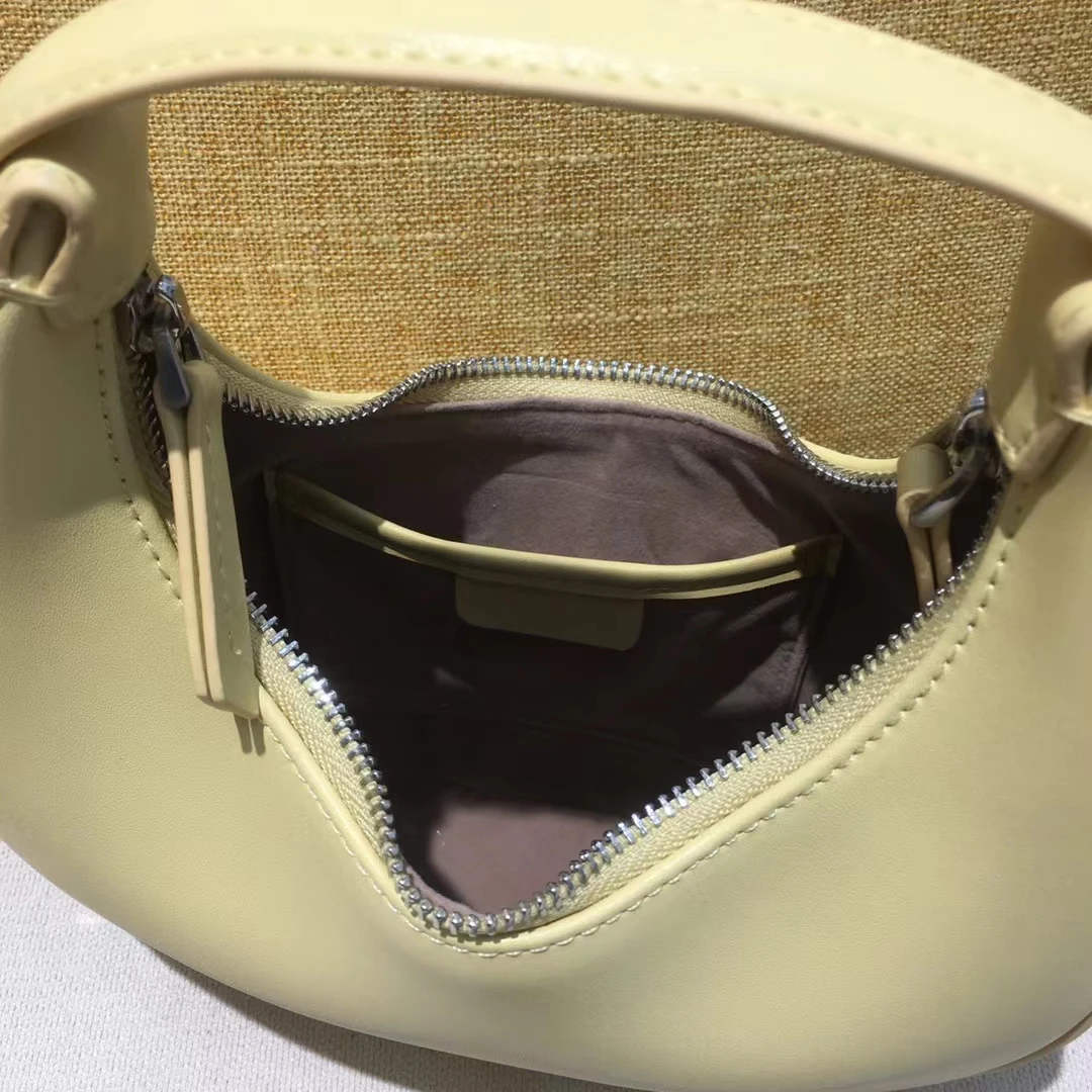 2024 new niche design mini crescent female moon bag leather armpit bag portable round bag Shoulder handbag