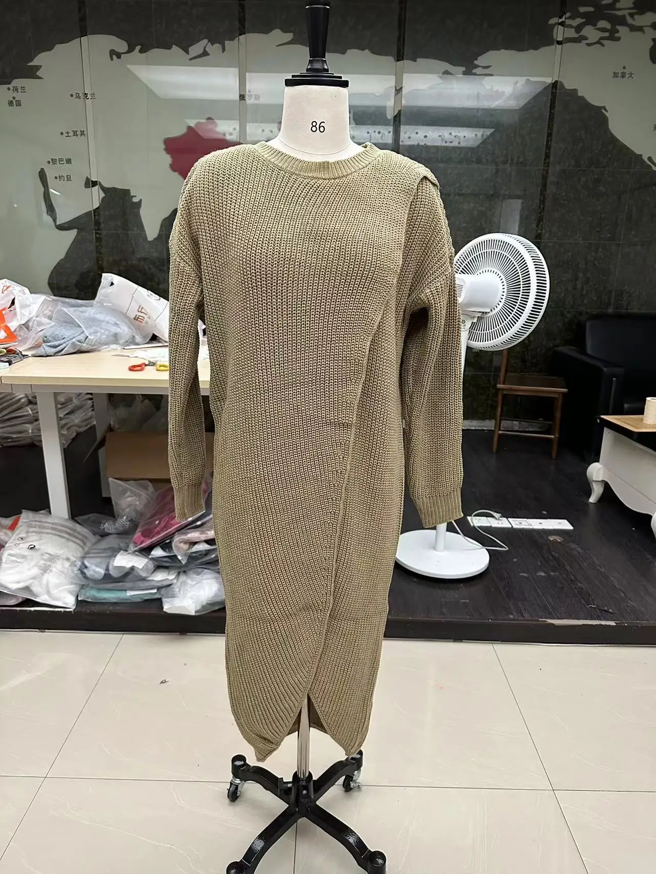 Women's Autumn Knitted Long Dress Solid Color Round Neck Pullover Long Sleeve Slim Temperament Commuting Irregular Dress Jacket Women's Autumn Knitted Long Dress Solid Color Round Neck Pullover Long Sleeve Slim Temperament Commuting Irregular Dress Jacket