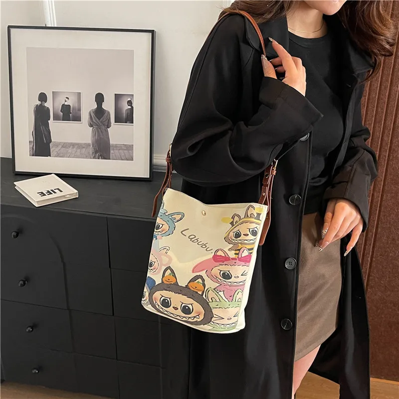 Cartoon LABUBU Canvas Bag for Students Large Capacity Commuting One Shoulder Bucket Crossbody Bag Anime Gift Cartoon LABUBU Canvas Bag for Students Large Capacity Commuting One Shoulder Bucket Crossbody Bag Anime Gift