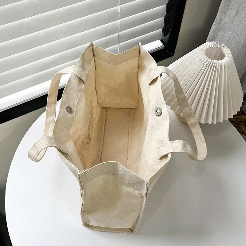 2024 New Labubu Printed Letters Tote Bag Large Shoulder Bag Ladies Canvas Zipper Concealed Commuting Everyday Joker Handbag 2024 New Labubu Printed Letters Tote Bag Large Shoulder Bag Ladies Canvas Zipper Concealed Commuting Everyday Joker Handbag
