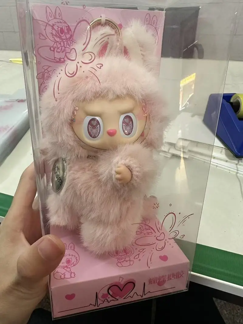 New 17cm Pop Labubu Pink Leader Butterfly Eye Angel Zimomo Leader Vinyl Doll Pendant Cute Ornaments Holiday Gift Toys New 17cm Pop Labubu Pink Leader Butterfly Eye Angel Zimomo Leader Vinyl Doll Pendant Cute Ornaments Holiday Gift Toys